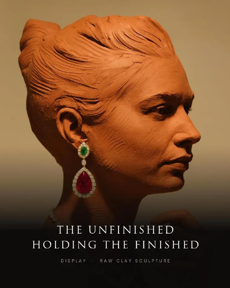 Couture de Jewels earring on a raw clay sculpture: the unfinished holding the finished